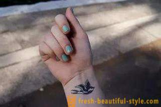 Ženska tetovaža na ruci: atraktivna izraz