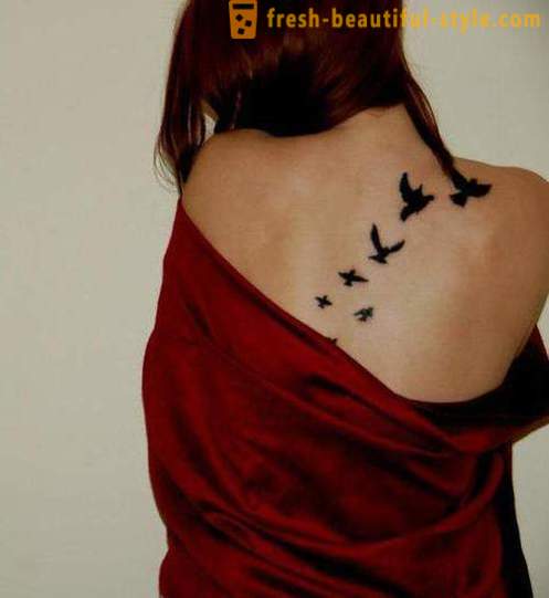 Lijepa žena tetovaža - da nasjeckati i tamo gdje je slika
